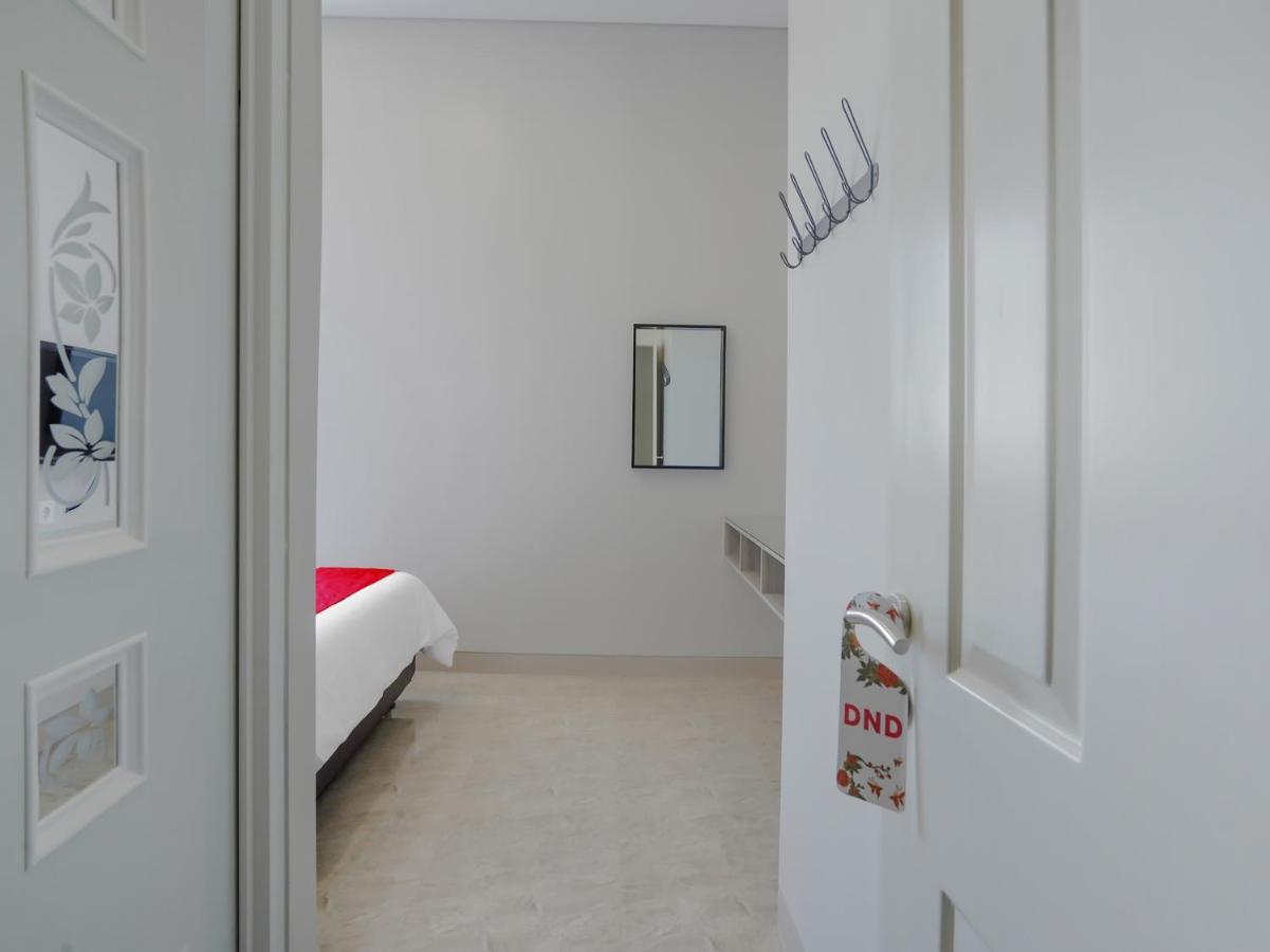 Super Oyo Capital O 90336 Olive Guest House Surabaya Eksteriør billede